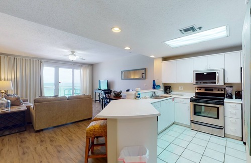 Destin Condo | Gorgeous beach view home with balcony, pool & fitness room