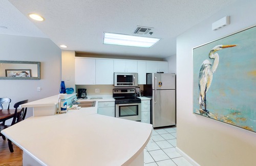 Destin Condo | Gorgeous beach view home with balcony, pool & fitness room