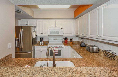 New Smyrna Beach Condo | Gorgeous Coastal Themed Condo with Views of the Estuary! OW10-303