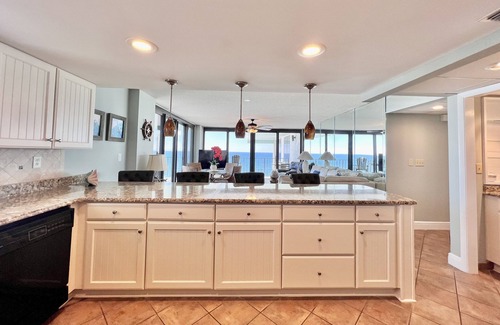 Biltmore Beach Condo | Gorgeous End Unit, Stunning Views, Free high speed WIFI and Beach Chair service