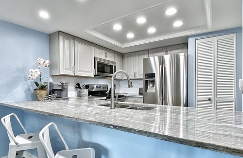 Indian Shores Condo | Gorgeous ground-floor condo -with partial Gulf view & beachfront heated pool/spa