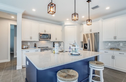 Trafalgar House | Gorgeous home with heated pool, lanai, grill, and washer/dryer