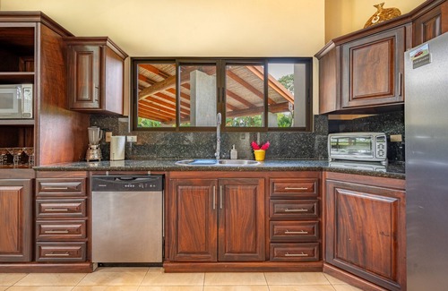 La Fortuna House | Gorgeous home with private artificial lake, fast WiFi, volcano view, & AC