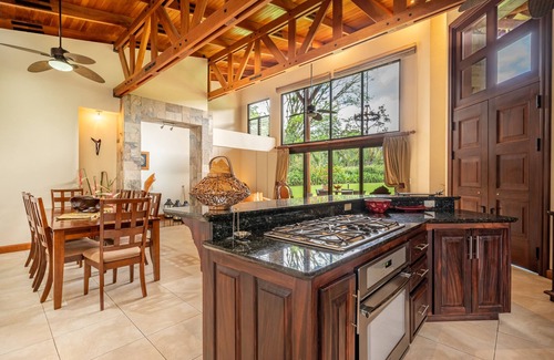 La Fortuna House | Gorgeous home with private artificial lake, fast WiFi, volcano view, & AC