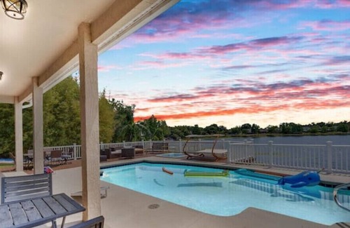 Mariner's VIllage House | Gorgeous Lakefront Pool Home W paddleboard, kayak, game room, king bed, and more