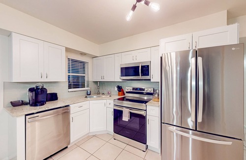 Cocoa Beach House | Gorgeous & modern dog-friendly getaway w/patio, AC, & W/D - steps to the beach
