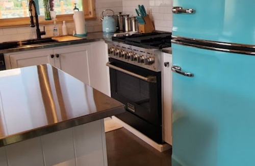 El Prado House | Gorgeous mountain views, a relaxing hot tub, and close proximity to all