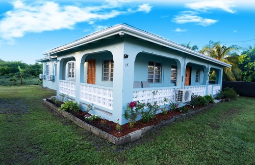 Estate Upper Love House | Gorgeous Newly Renovated Home Centrally Located, Minutes From Shopping & Beaches