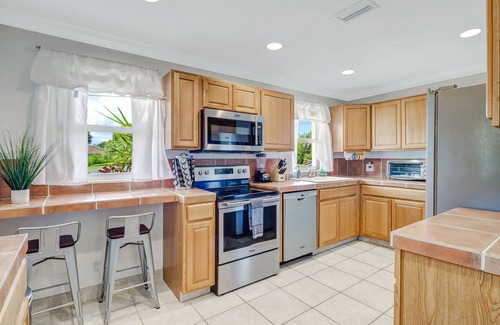 Palm River Estates House | Gorgeous Private Heated Pool Home near the beaches