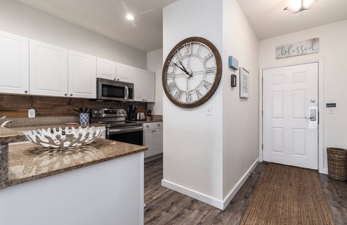Frangista Beach Condo | Gorgeous renovated condo - Steps from the Beach! Heated Pool! Hot tub!