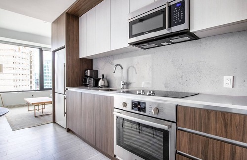 Seaport District Apartment | Gorgeous Seaport 1BR w/Gym, Pool, W/D, Doorman, by Blueground