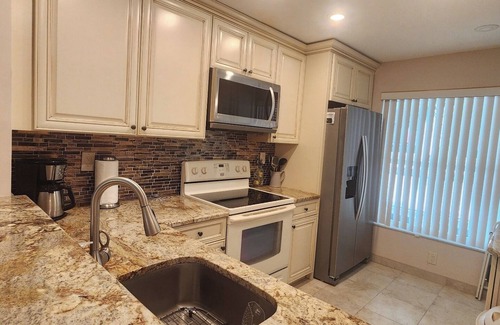 Casa del Mar Condo | Gorgeous Second Floor Waterfront Villa with Sunset views over Boca Ciega Bay!