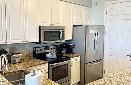Miramar Beach Condo | GORGEOUS SUNSETS; EV CHARGING; NEW FURNISHINGS; 2 BEACH CHAIRS; 2 POOLS;