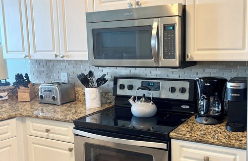 Miramar Beach Condo | GORGEOUS SUNSETS; EV CHARGING; NEW FURNISHINGS; 2 BEACH CHAIRS; 2 POOLS;