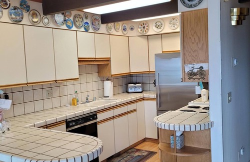 Lake Forest Condo | Gorgeous, sweeping views of Lake Tahoe from 3 story lake front condo!
