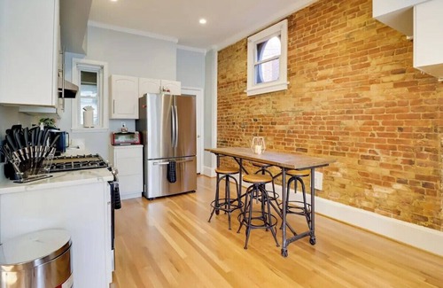 North Capitol Street House | Gorgeous Victorian Townhome with Balcony in Vibrant Washington.