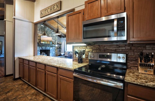 Chalet Village Cabin | Gorgeous Views and Spacious Decks! Two Wood Burning Fireplaces