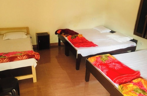 Uttarkashi Hotel | Goroomgo Amba Niwas Home Stay Uttarkashi