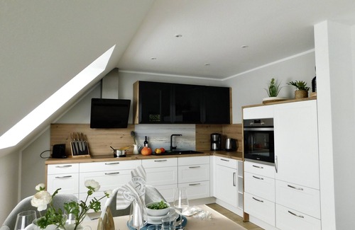 Greetsiel Apartment | Grachtensteern- Maisonette Og-ferienwohnung Direkt an der Greetsieler Gracht