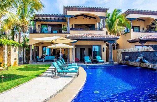 Sunset Beach House | Grand and elegant home near beach, restaurants and a Jack Nicklaus golf course.