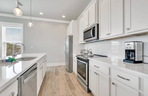 Miramar Beach House | Grand Boz Chateau with Low-Speed Vehicle, Heated Pool, and Cornhole Field