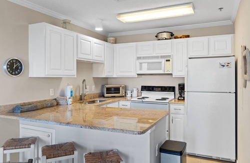 Ono Island Condo | Grand Caribbean West 311 | Walk to Beach | Community Pool