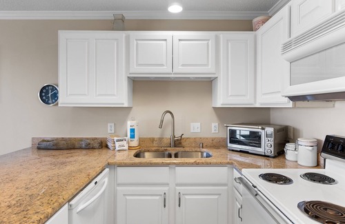 Ono Island Condo | Grand Caribbean West 311 | Walk to Beach | Community Pool