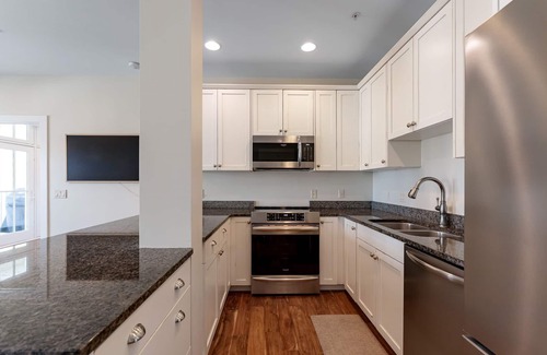 Grand Haven Condo | Grand Haven Water Views w/Pool & Fire Pit across from the Boardwalk!