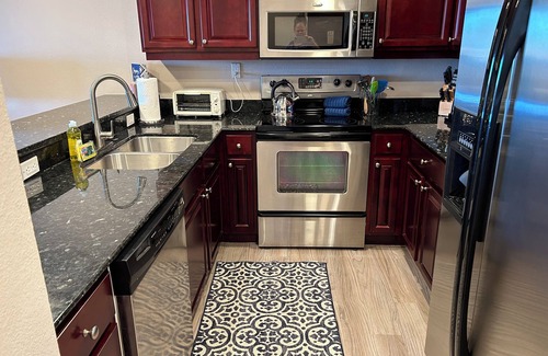Estate Enighed Condo | Grande Bay~RENOVATED~Parking Spot~Walk to Restaurants and beaches