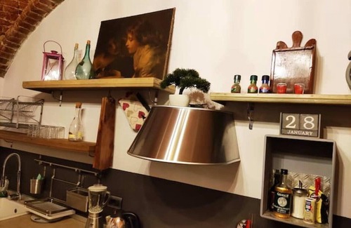 Belveglio Apartment | Grape Court. Cellar Apartment.