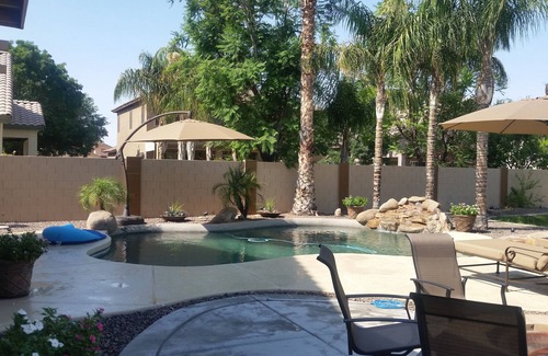 Chandler House | Great House with a jacuzzi, pool, outdoor fireplace & a large backyard!