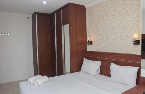 East Jakarta Apartment | Great Location and Comfy 1BR Apartment at Woodland Park Residence By Travelio