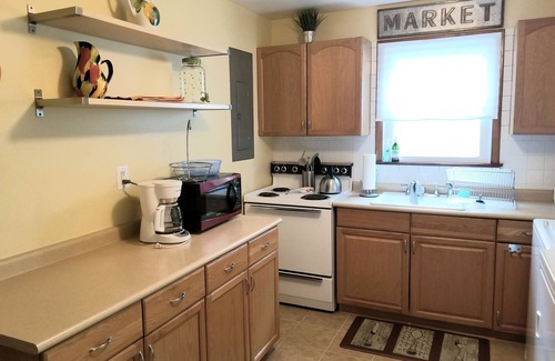 Issue House | Great Rates, Cozy Cottage just minutes from the Beach ~ Enjoy the Porches !