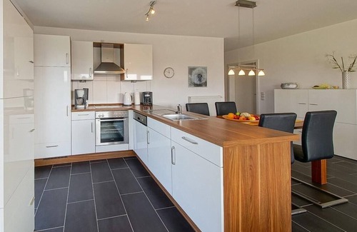 Schillig Apartment | Great vacation apartment on the North Sea with south-facing balcony and sauna - 200 m to the beach