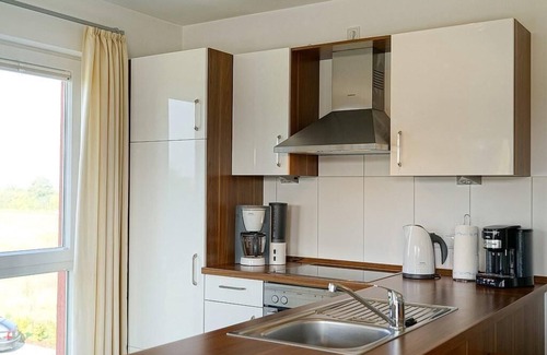 Schillig Apartment | Great vacation apartment on the North Sea with south-facing balcony and sauna - 200 m to the beach