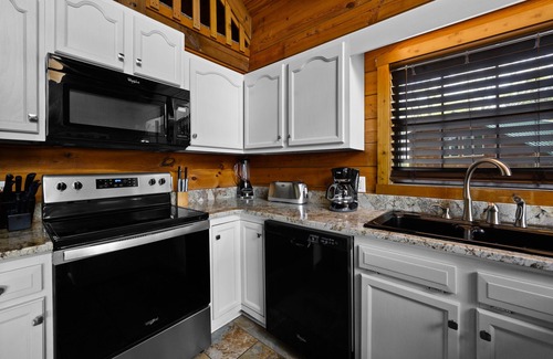 Pigeon Forge Cabin | Great Views! Firepit, Pool Table & arcade , Hot Tub, 1 Mile from Downtown