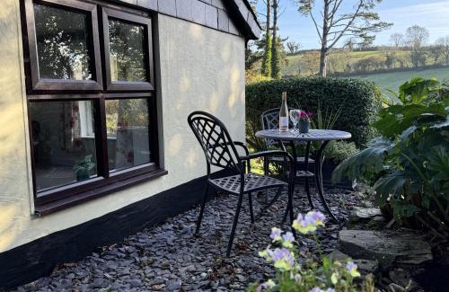 Bugford House | Greenswood Cottage - Cosy cottage, rural location, beautiful landscaped gardens with pond and lake