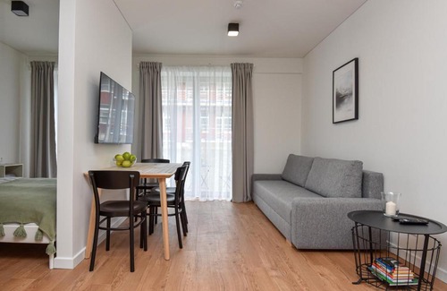 Juodkrante Apartment | Grey Hill