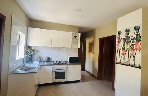 Lusaka House | Grey Mango