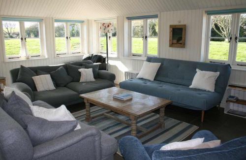 Newport House | Greystone Cottage - Sea views, short stroll to a beautiful sandy beach