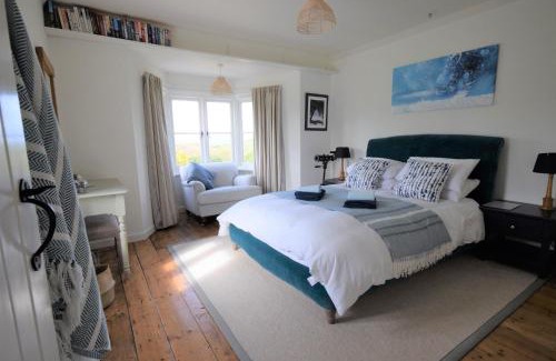 Newport House | Greystone Cottage - Sea views, short stroll to a beautiful sandy beach