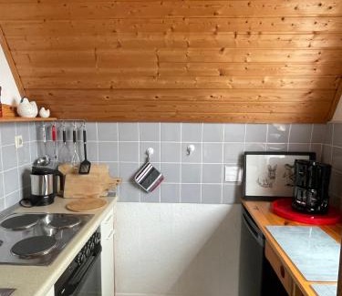 Harlesiel House | Grietje I rotes Haus links