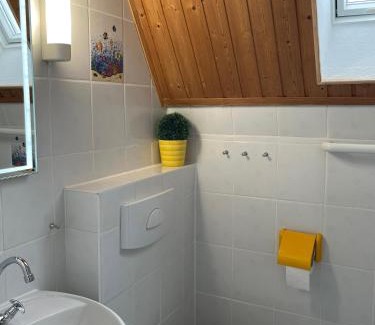 Harlesiel House | Grietje I rotes Haus links