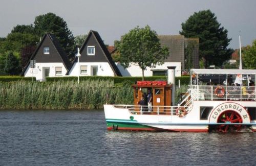 Harlesiel House | Grietje II blaues Haus rechts
