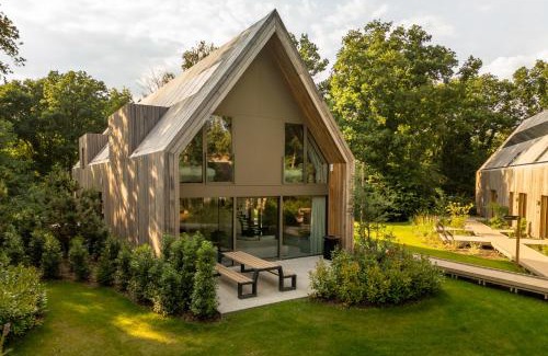 Zolder House | Groepslodge - 10 personen - Woodz Lodges