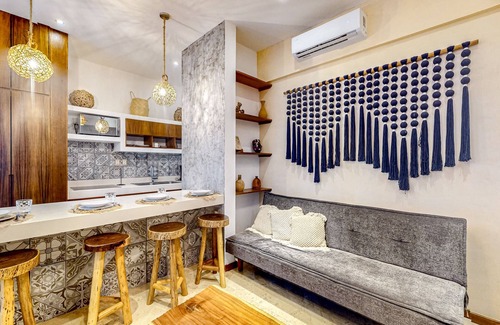Zama Apartment | Ground-floor apt near downtown Tulum with rooftop pool, gym, soaking tub, & AC