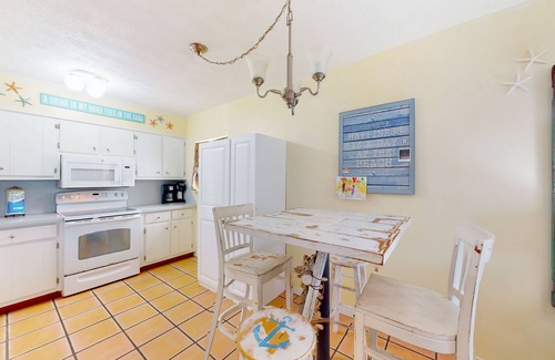 East End Condo | Ground-floor condo with gulf views, patio, sunroom, & easy beach access