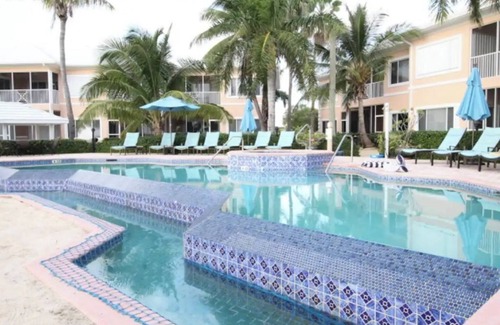 Rum Point Condo | Ground floor condo w/screened porch - steps from the ocean
