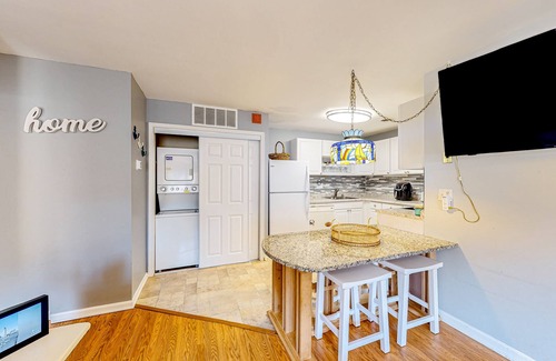 Caine Woods Condo | Ground-floor condo with pool & fenced patio - 4 blocks to the beach