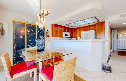 Townsite Condo | Ground-floor condo with ocean views, fireplace, on-site hot tubs & sauna